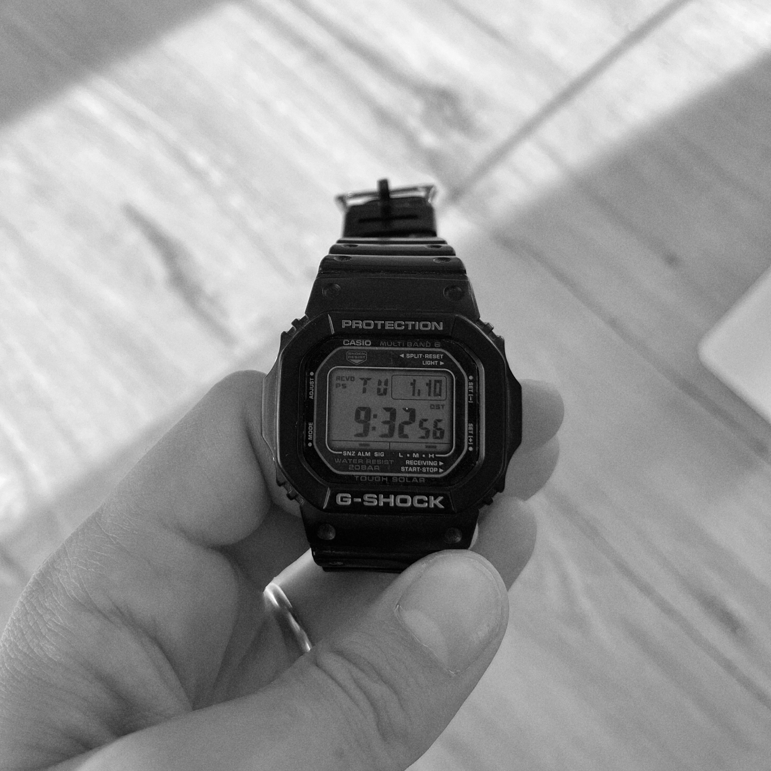 black and white image of a gshock 5610u